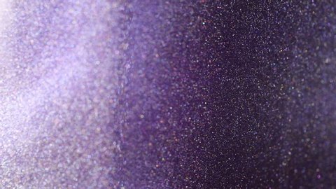 violet thick liquid with pearly shine. abstract background