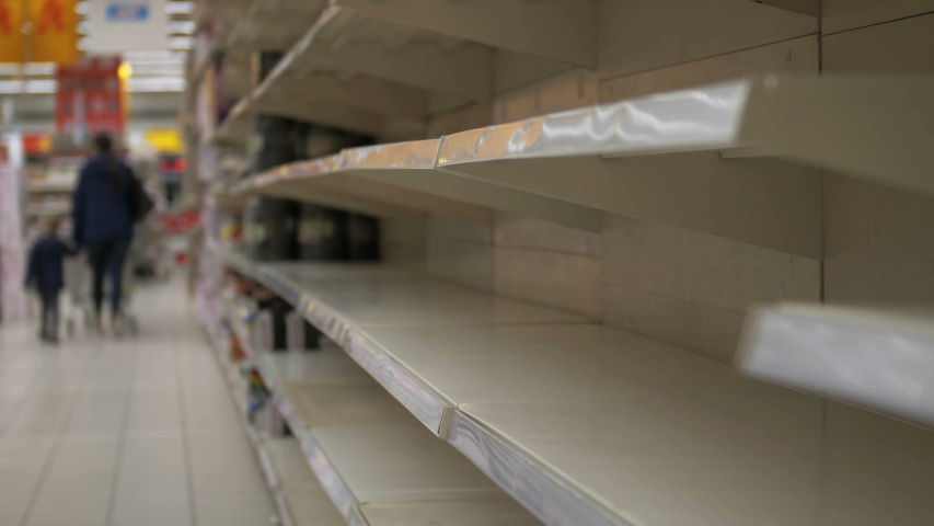 Empty shelves in store. Supermarket with empty shelves for goods Royalty-Free Stock Footage #1039686707