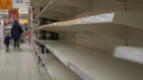 Empty shelves in store. Supermarket with empty shelves for goods