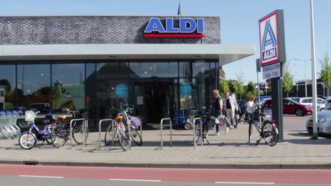Bodegraven / Netherlands - September 13, 2019 : Exterior of Aldi supermarket food grocery shop with bike rack