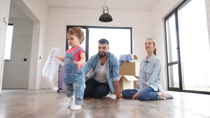 The young family is in their new summer house, where they are making plans to renovate the house. | Shutterstock HD Video #1039692113