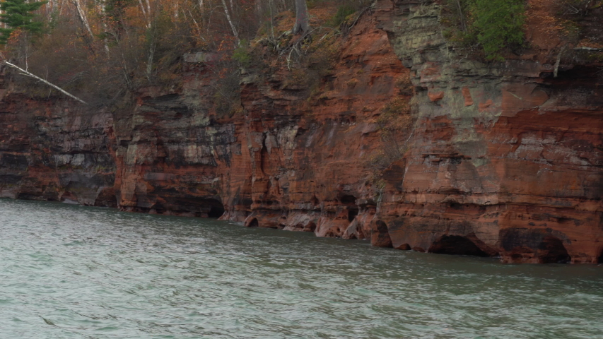 Apostle Islands mainland sea caves along the Bayfield Peninsula along Lake Superior in Wisconsin - Panning shot