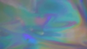 Holographic surreal iridescent calm background. Slow motion live wallpaper. Abstract trendy colors blurred movie. Can use in vertical position