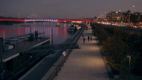 Unrecognizable people on the promenade. Evening n Warsaw. - Powered by Shutterstock - Get 15% off with code: PIKWIZARD15