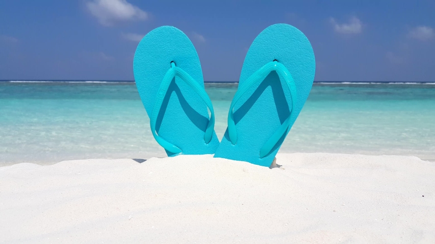 Turquoise Flip Flops On White Soft Sand Beach In A Summer Sea Background, Seychelles Royalty-Free Stock Footage #1039711109