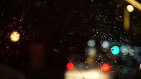 specially defocus video from the lights of cars in the night city. car rides on a night street