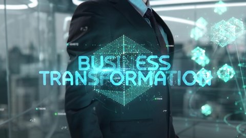 Businessman with Business Transformation hologram concept