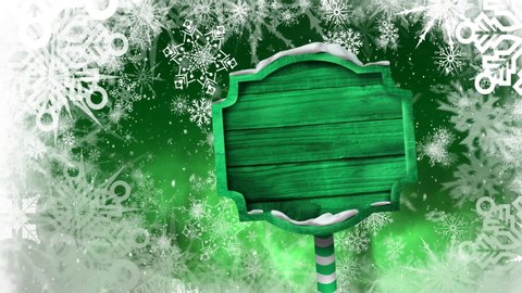 Animation of snowflakes falling and green wooden sign board on green background