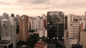 A magnificent aerial view through the buildings of Sao Paulo shot in 4K. Sao Paulo. Brazil.