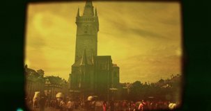 Shot on an original vintage lo-fi camera, blurred with noise, dirt and interferences view of Old town square. Timelapse of a popular tourist destination of Prague.