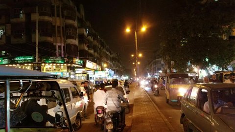 Karachi, Sindh / Pakistan - October 7, 2019: Night footage of Burns road food street in Karachi. Place where daily thousands of Karachiiets enjoy their dinner.