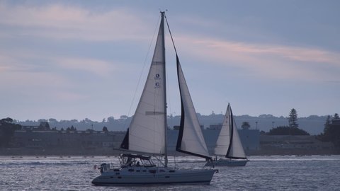 San Diego, USA, 2018. Sail ships are moving in Coronado bay on sunset. Relax, chill, vacation, travel concept