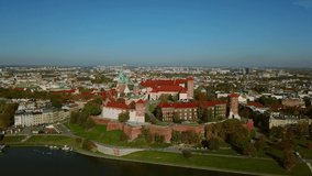 Aerial view. Wawel royal Castle and Cathedral, Vistula River, Cracow old city with historic churches in the background. Krakow, Poland. 