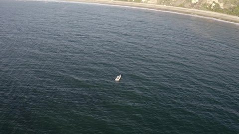 Boat Floating At Palos Verdes, California During The Summer Day Time. Wide aerial orbit.