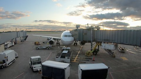 Airplane Parked Airport Gate Jetway Bridge Stock Footage Video (100% ...