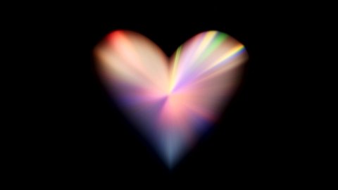 Heart prism. Romantic overlay. Iridescent crystal reflection lights motion on black background.