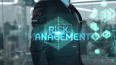 Businessman with Risk Management hologram concept