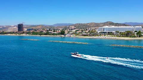 Sunny Limassol coast following a wakeboarder, Cyprus 