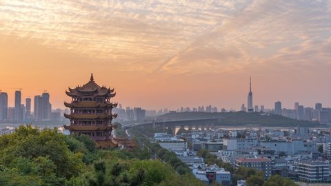 The yellow crane tower , located on snake hill in Wuhan, is one of the three famous towers south of yangtze river,China.4 Chinese letters on tower is "Nang Xiong Gao Gong" means "amazing heaven"