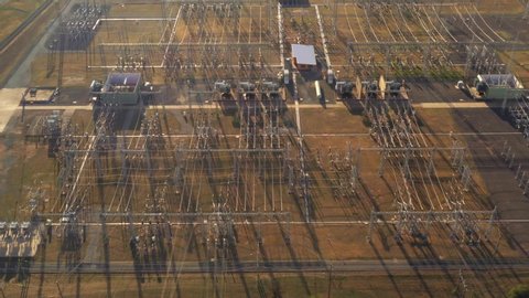 Aerial drone view of an electrical distribution substation for the generation and supply of energy to households and industry  