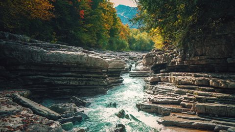 4K UHD Cinemagraph / seamless video loop of the mountain river Taugl in Austria, close to Mozart birthplace Salzburg. The water is rushing through naturally formed rocks.