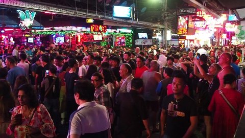 Pattaya, Thailand - March 22, 2019: Famous red light district Walking street in Pattaya with many clubs, bars and prostitutes. The street is a tourist attraction for night life and entertainment. 