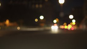 Defocused Night City Lights near Eiffel Tower in Paris. Color Blurred bokeh of moving cars and bus in street. Static Shot 4K UHD. Lens flare, wide shot, people passing by. - Powered by Shutterstock - Get 15% off with code: PIKWIZARD15