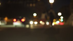 Defocused Night City Lights near Eiffel Tower in Paris. Color Blurred bokeh of moving cars and bus in street. Static Shot 4K UHD. Lens flares, wide shot. - Powered by Shutterstock - Get 15% off with code: PIKWIZARD15