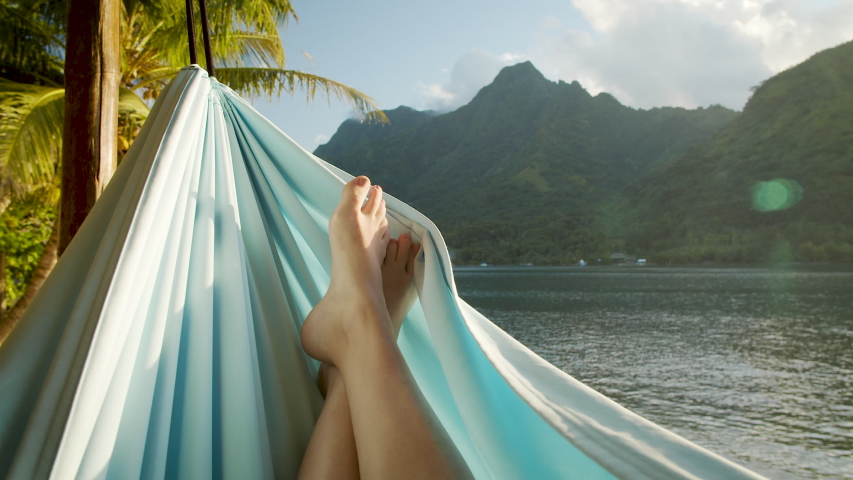 POV Shot of Woman Lying in Hammock in the Tropics Royalty-Free Stock Footage #1039941545