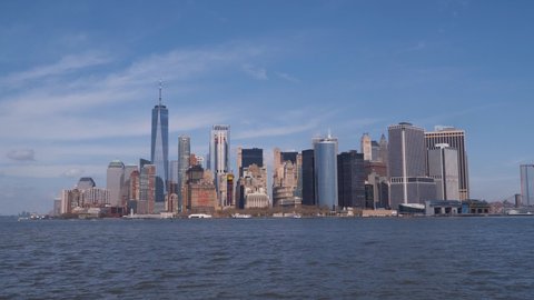 New York, Manhattan skyline with many skyscrapers shot from the Hudson river