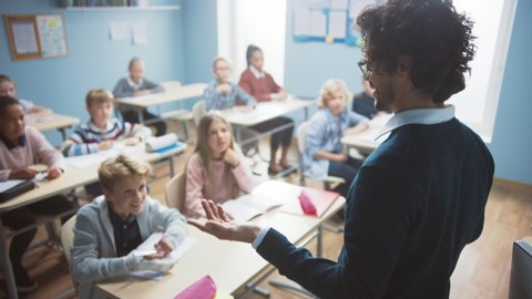 elementary classroom diverse bright children listening Stock Footage ...