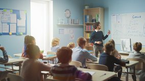 Caring Teacher Explains Lesson to a Classroom Full of Bright Diverse Children. In Elementary School with Group of Smart Multiethnic Kids Learning Science, Whole Classroom Raising Hands Knowing Answer - Powered by Shutterstock - Get 15% off with code: PIKWIZARD15