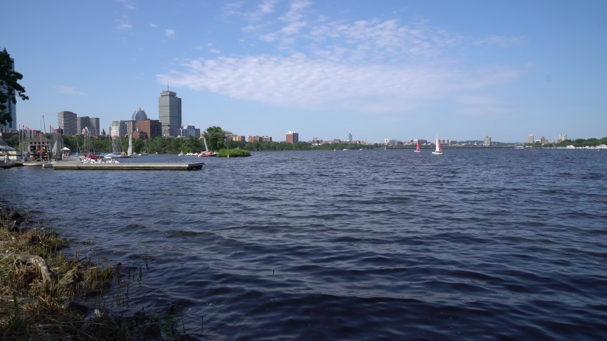 Sailing on the Charles river on a windy day with the Boston skyline in the background