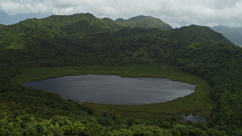Aerial view of lake in crater of volcano / Grand Etang National Park, Grenada