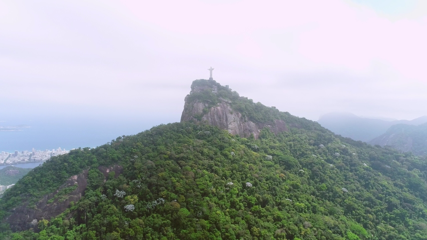 Aerial view of Cristo Redentor, Christ the Redeemer Statue over Rio de Janeiro City, Brazil