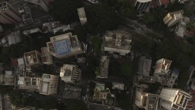 A remarkable aerial view tilting up onto the city of Sao Paulo shot in 4K. Sao Paulo. Brazil.