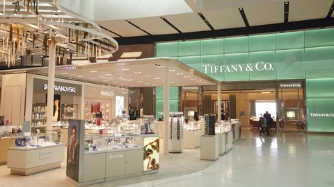 Sydney, NSW / Australia - Oct 17 2019: Duty free in Departure terminal of Sydney (Kingsford Smith) Airport with passengers retail luxury outlets restaurant and shops. tiffany and co pandora
