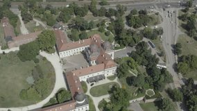 Aerial view of the city centre and the Grassalkovich Castle in Gödöll?, Hungary - drone 4K video