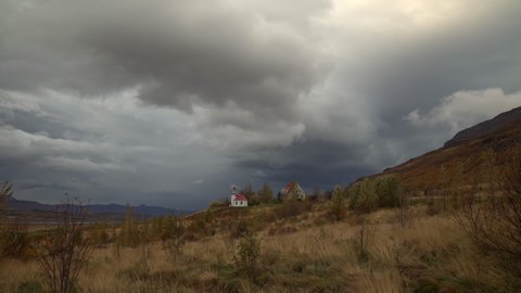Small country church under storm clouds windy day Iceland.mov
