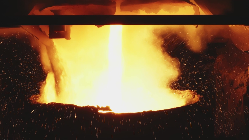 Molten Metal Pouring, Metallurgy, Steel Casting Foundry. Hot Metal Blast Furnace. Steel Industry Factory Interior. Workplace Metal Foundry Metallurgy. Steel Manufacturing. Close up.  | Shutterstock HD Video #1040041298