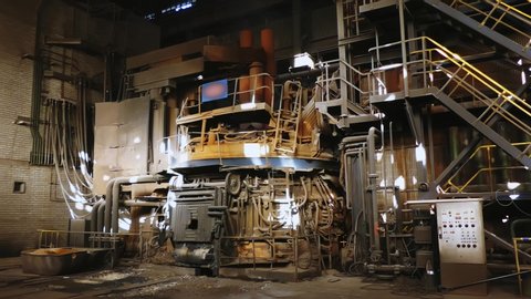 Steel production in a steelmaking furnace. Metallurgy. Casting ingot. Electric arc furnace shop. Shop EAF. Plant for the production of steel. An electric melting furnace. 