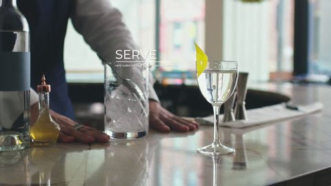 How to make a Martini Part 7 of 7: A barkeep serves the mixed cocktail in a classy bar. 4K RED with motion graphics.  