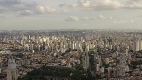 A breath taking aerial view of sunset light hitting the buildings of Sao Paulo shot in 4K. Sao Paulo. Brazil.