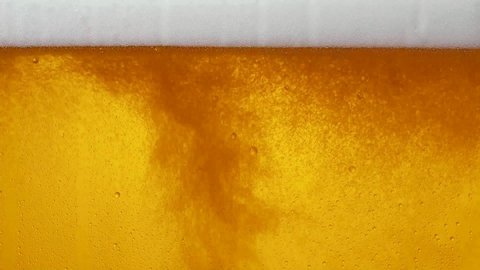 Close-up shot of beer bubbles