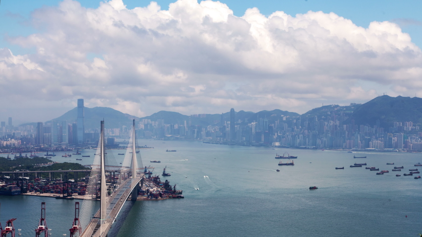 Timelapse Hong Kong city with famous Stonecutters Bridge