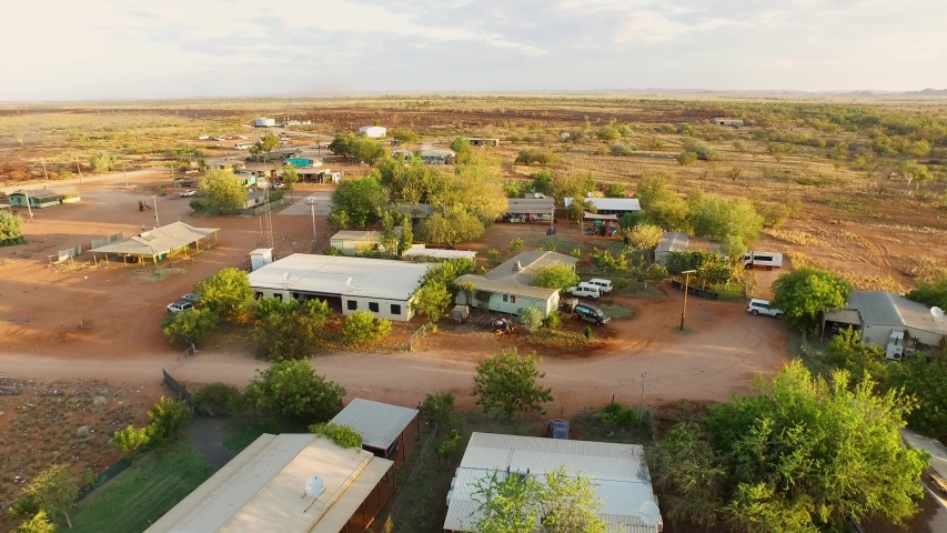 Aerial video footage over small remote aboriginal Australian community (Warralong near Port Hedland) in the Western Australian outback (Pilbara Region).
 Royalty-Free Stock Footage #1040094983