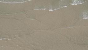 Aerial view of the ocean tropical Sea waves seamless loop on the beautiful sand beach
