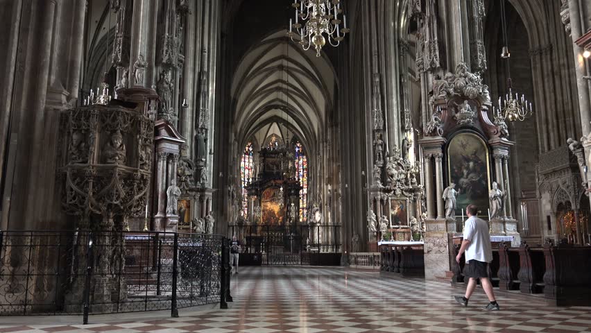 VIENNA - AUSTRIA, JULY 16, 2014, ULTRA HD 4K Famous St Stephens Cathedral indoor with altar and golden statue 