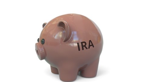 Money fall into piggy bank with Individual Retirement Account IRA text. Savings related 3D animation