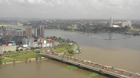 Abidjan, Ivory Coast - FESTIDEC 2019: drone aerial view of the city and Général de Gaulle bridge